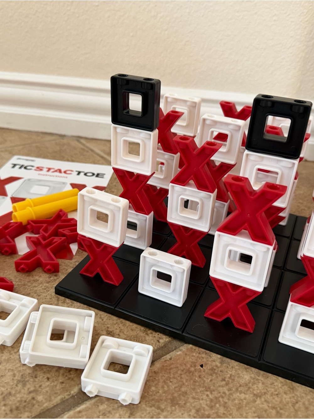 Tic Stac Toe Stackable Strategy Game - Red, White & Black